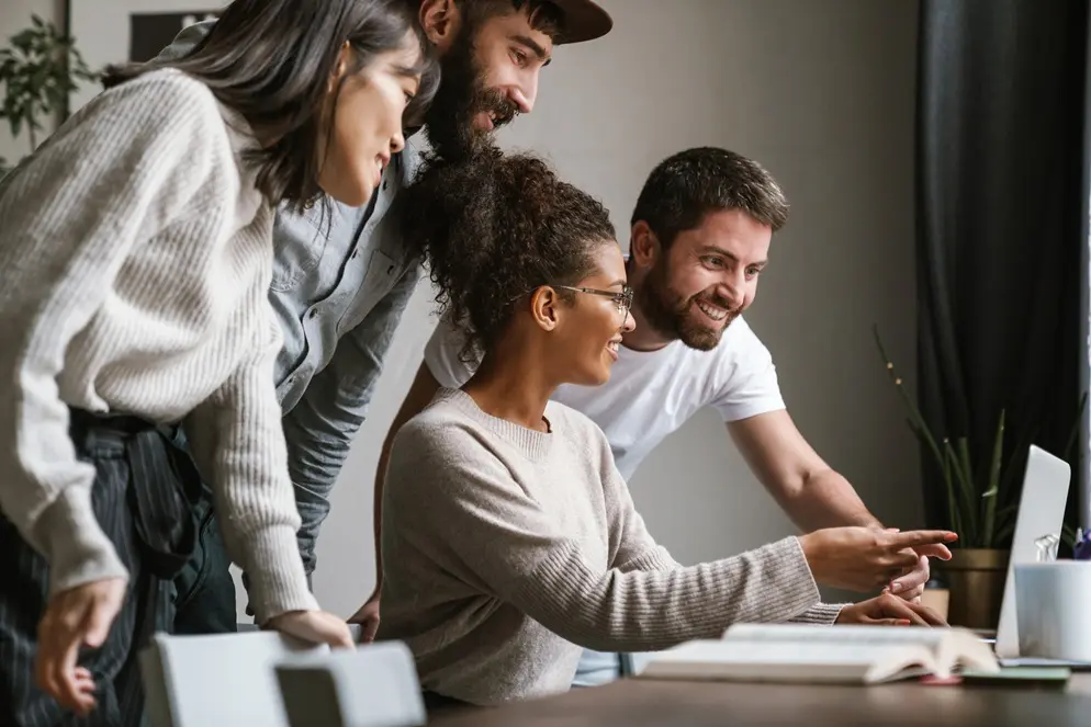 Web design professionals collaborating on website development and digital marketing strategy for business growth.